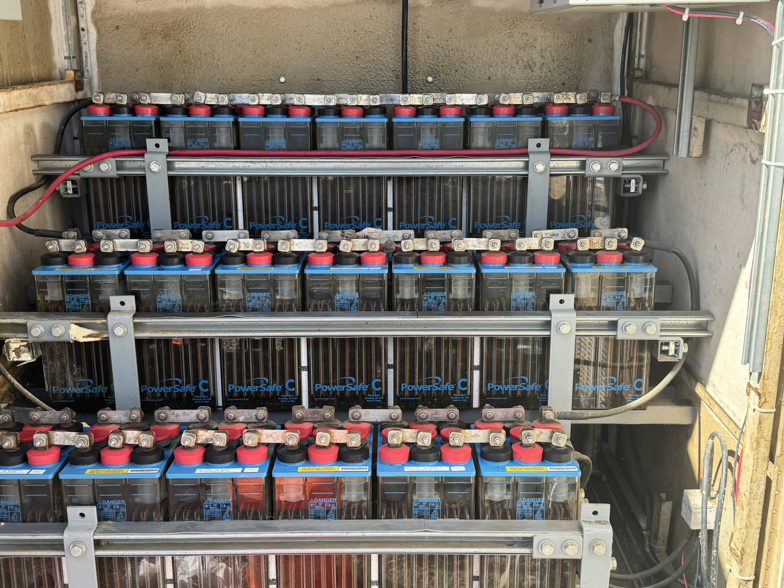 Substation battery bank installation with PowerSafe batteries on racks